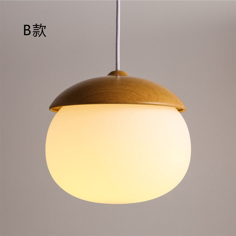 Moderne Pendelleuchte in Nussform – Dekorative Hängelampe mit Glas & Holzoptik
