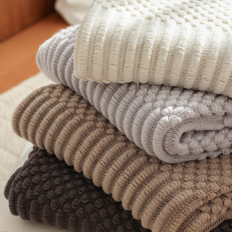 Strickdecke mit Fransen – Weiche Wohndecke im modernen Strukturdesign
