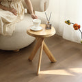 Runder Hocker aus Massivholz im Wabi-Sabi-Stil