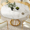 Runder Esstisch mit Marmormuster und elegantem Metallgestell