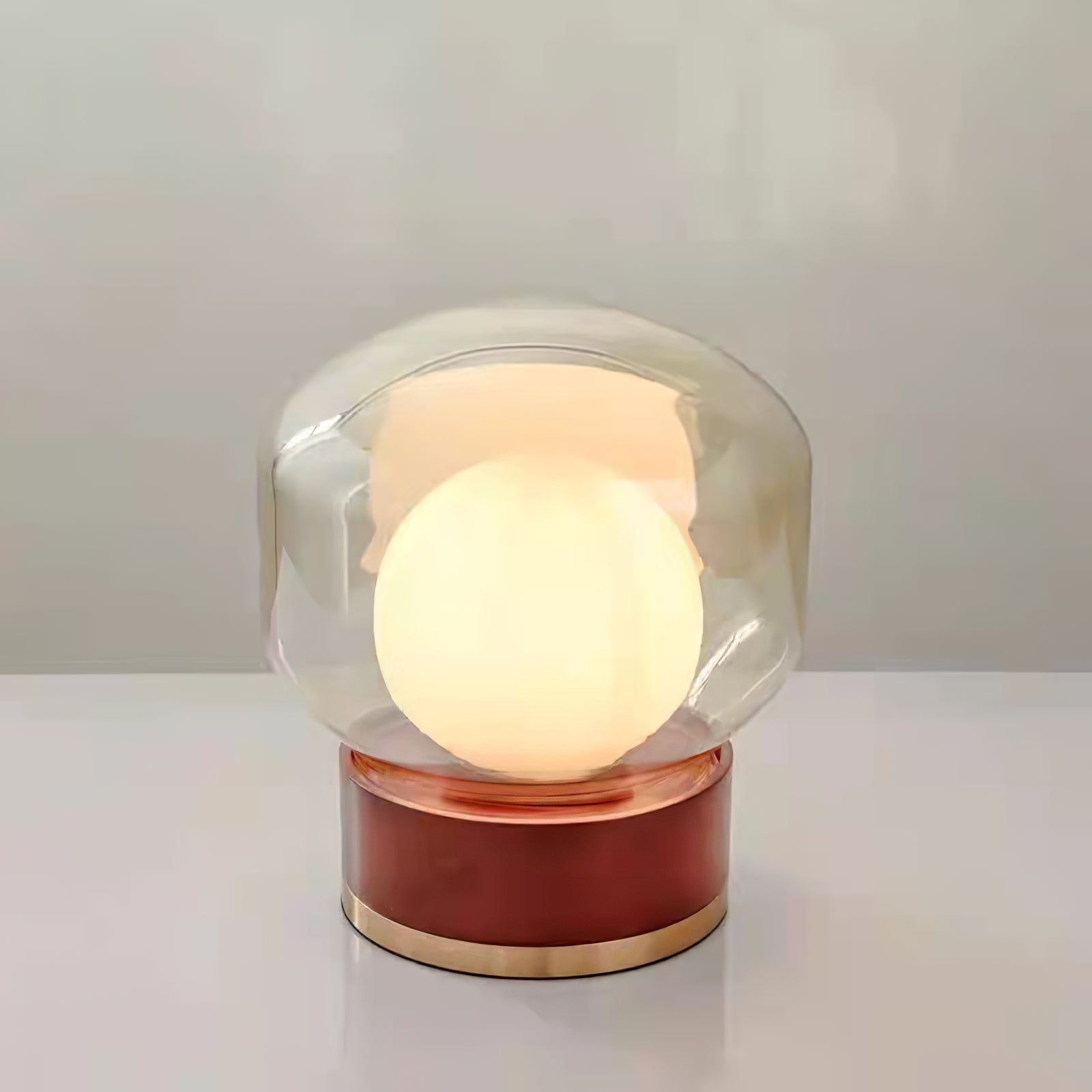 Moderne Tischleuchte aus rundem Glas