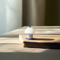 Nachttischlampe in Creme mit geometrischer Atmosphäre